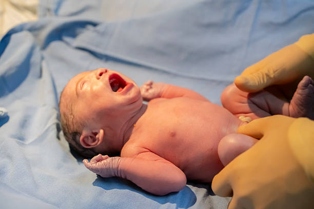 istock medical team in cesarean delivery process 2224329379