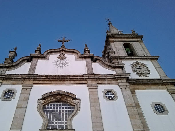 Low angle view of peso da regua matriz church decorated with lights for a fado concert event, peso da regua city, portugal