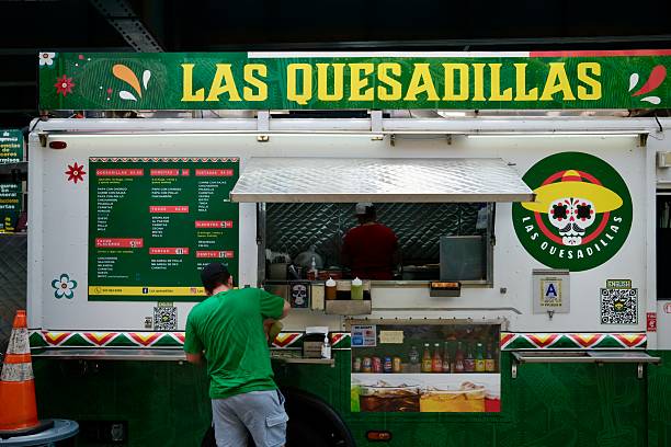 Mexican Food Truck Offering Quesadillas, Tacos, and Aguas Frescas stock photo