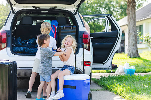 istock Happy Family Loading Up for a Summer Vacation 2224347801