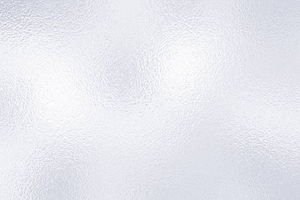 istock white foil frosted glass texture background. Abstract gradient bright light reflection and shiny rough texture surface 2224348763