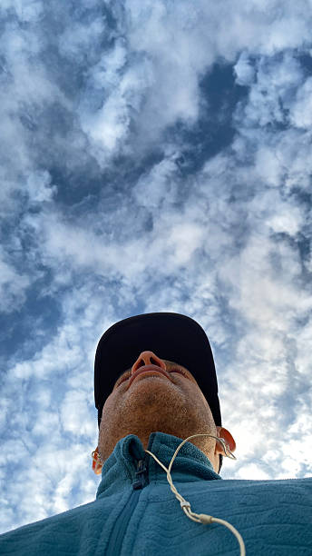 istock Athlete mid adult looking away against clear sky 2224383554