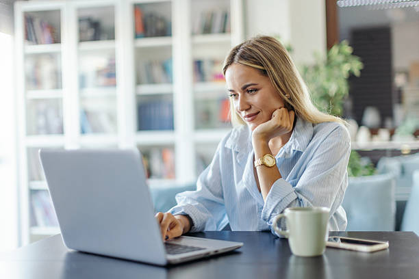 istock Mid adult woman working from home 2224385144