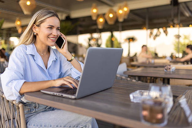 istock Beautiful woman working from cafe 2224385974