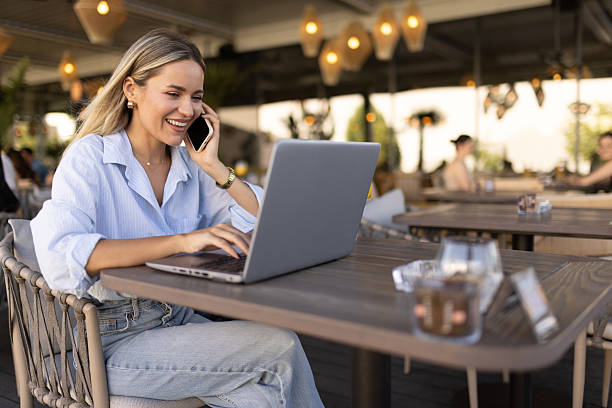 istock Beautiful woman working from cafe 2224386096