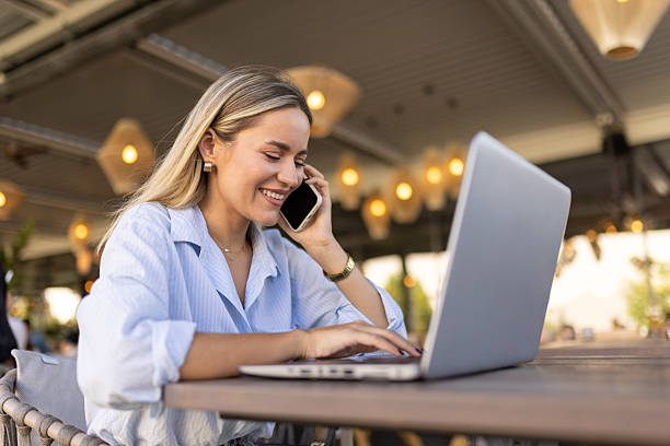 istock Beautiful woman working from cafe 2224386131
