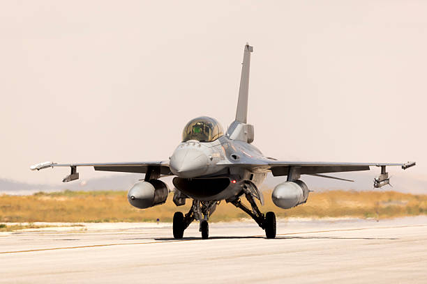 istock Solo Military Fighter Jet on Airstrip 2224387347
