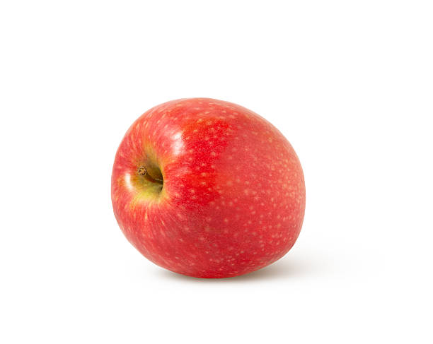 istock Whole red apple isolated. Pink lady apple with shadow isolated. 2224389587