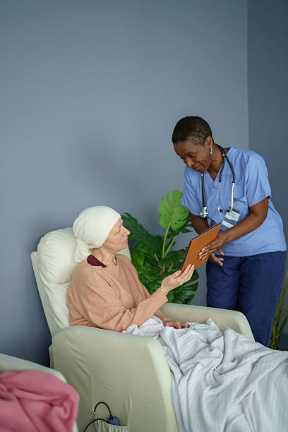 istock Nurse Assisting Patient in Medical Setting with Compassionate Care 2224395468