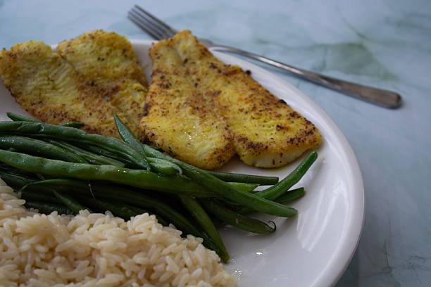 istock Pan-Seared Sole Fillet with Green Beans and Rice 2224399436