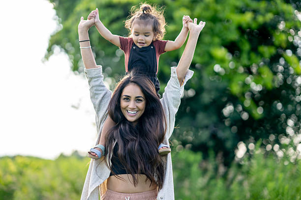 istock Piggyback Rides from Mom 2224401319