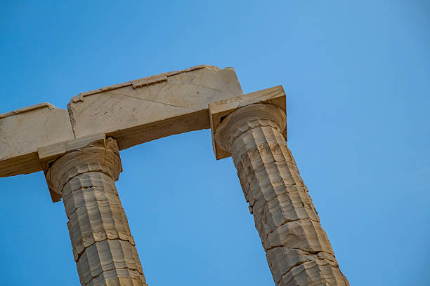 The Temple of Poseidon at Cape Sounion, a striking Doric ruin from Athens' Golden Age, perched above the Aegean Sea with panoramic coastal views—especially breathtaking at sunset.