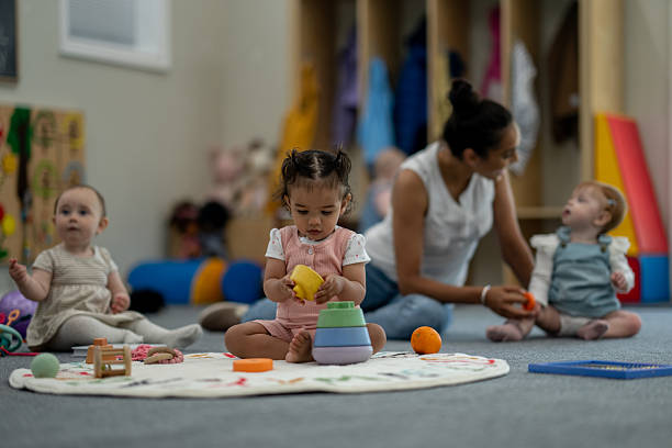 istock Group of Children Playing Together in a Cozy Classroom Environment 2224402237