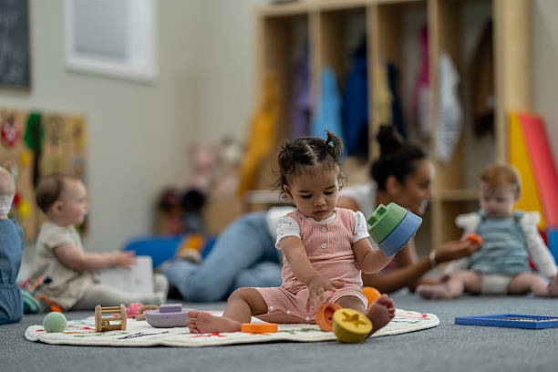 istock Group of Children Playing Together in a Cozy Classroom Environment 2224402238