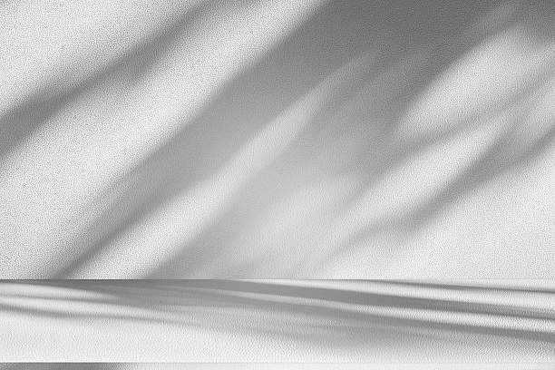istock Wall interior background, studio and backdrops show products.with shadow from window color white . background for text insertion and presentation product 2224404471