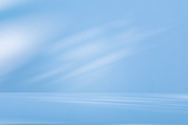 istock Studio style background wall decoration presentation uses white and blue tones. with shadows cast from a nearby window, concept creating a decorative 2224404473