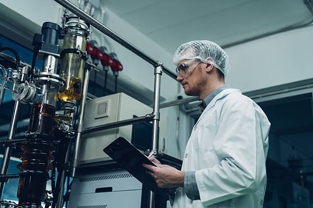 istock Scientist checking rotational vaporizer during CBD oil extraction 2224420144