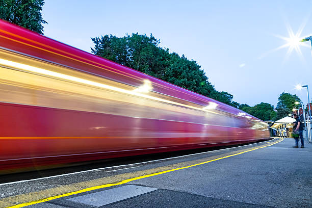 istock A passenger train passing through the station 2224421144