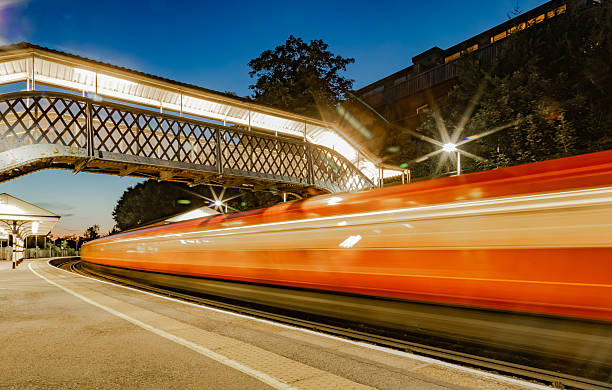 istock A passenger train passing through the station 2224421195