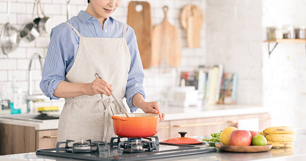 istock Japanese woman cooking in the kitchen 2224421421