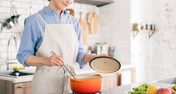 istock Japanese woman cooking in the kitchen 2224421432
