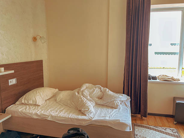 istock Unmade Bed in Minimalist Room 2224421756