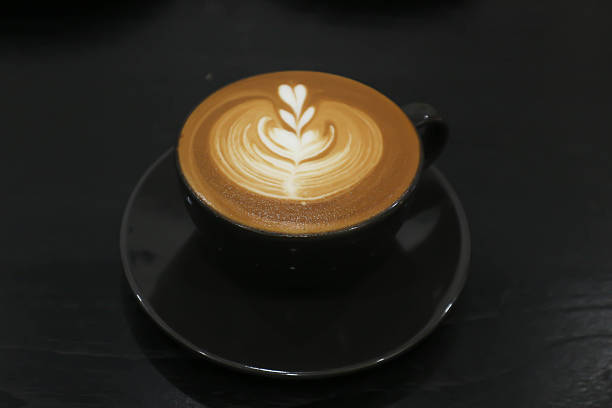 istock hot cofffee, cappuccino coffee or latte coffee or flat white or latte art 2224421763