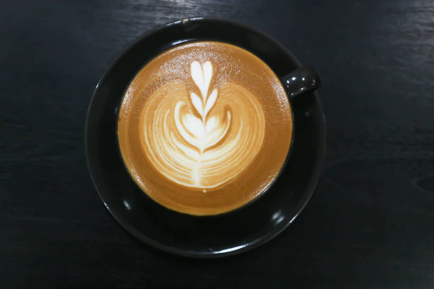istock hot cofffee, cappuccino coffee or latte coffee or flat white or latte art 2224421764