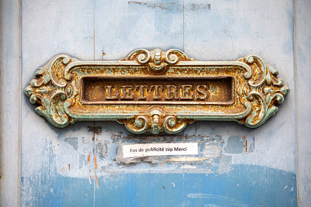 Iceland: Old Blue Mailbox on White Wall. Copy space available.