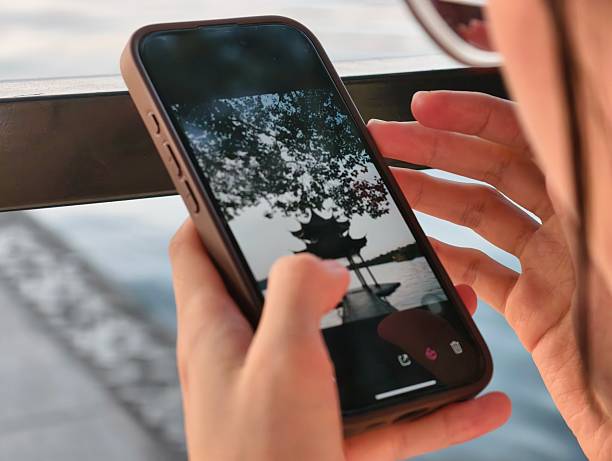 istock view picture in smart phone 2224426425