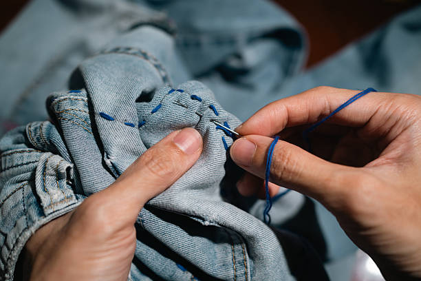 Mending jeans with Sashiko, a traditional Japanese embroidery and stitching technique