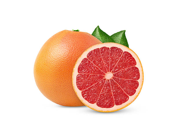 istock Whole grapefruit and cut in a slice isolated with green leaf. 2224429392