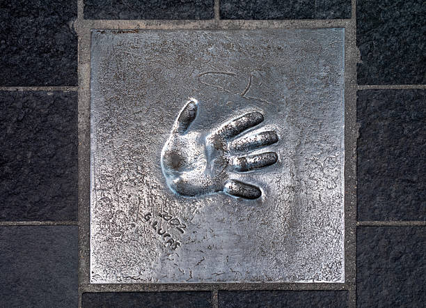 The handprint from famous American film director and producer George Lucas set into the pavement of The Allée des Étoiles (Avenue of the Stars) in Cannes, France.