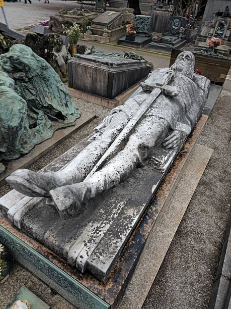 Milan, Italy - July 31, 2025: The historic cemetery known as Cimitero Monumentale, Milan, Lombardy, Italy: a tomb
