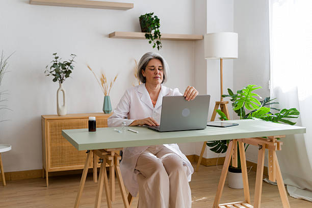 istock Professional Woman Working on Laptop in Modern Office 2224432965