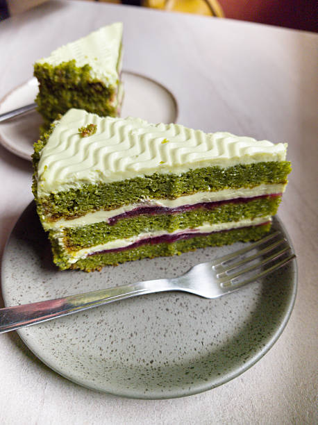 istock Delightful layers of spinach and raspberry cake served on elegant plate 2224436410