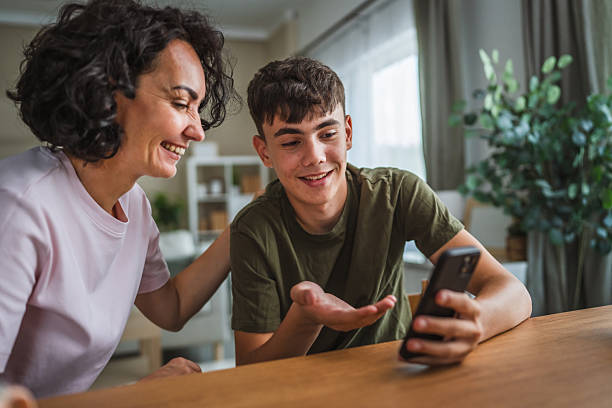 istock talk mother support and solving problem together with teenage boy son, share experience and opinion 2224436851