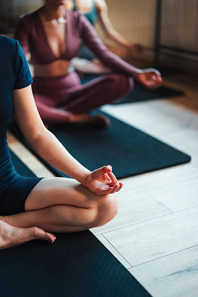 istock Group Meditation in a Calm Yoga Studio Promoting Relaxation and Mindfulness 2224443326