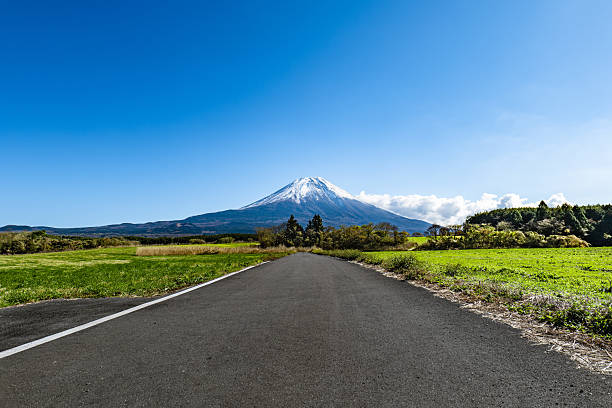 istock a straight road heading straight to mt. fuji, 2224443443