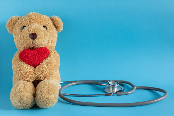 istock close up teddy bear as paediatrician with stethoscope on blue color background for representative of medical as kid and childhood concept 2224443869