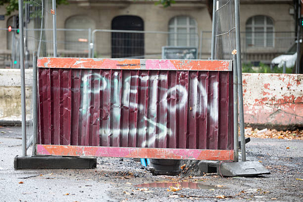 istock Pedestrian sign spray painted on corrugated metal 2224443990