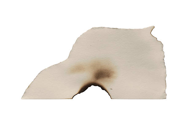 istock Brown And Beige Burnt Textured Paper Piece 2224447667