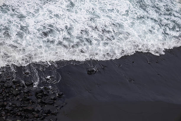 istock aerial view of a black sandy beach 2224451012