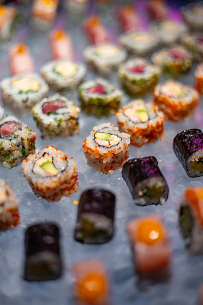 istock Assorted Sushi Rolls and Nigiri on Ice Display 2224453388