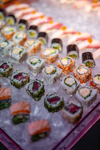 istock Assorted Sushi Rolls and Nigiri on Ice Display 2224453397