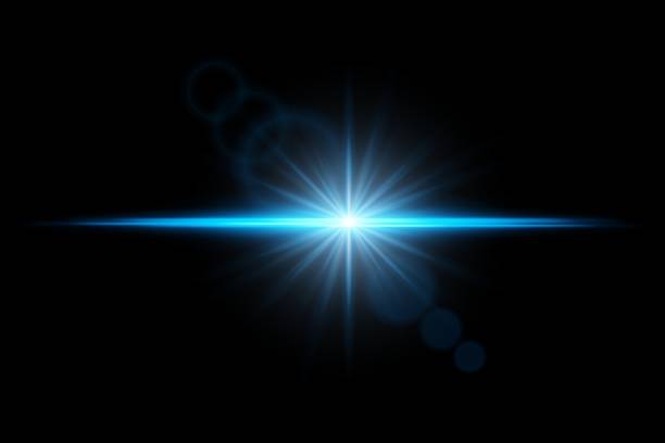 istock Intense bright flare burst with radial beams and lens reflection. Central explosion of light on dark background. 2224457246