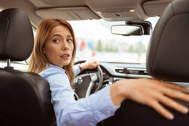 istock Confident Young Woman Driving Car 2224457304