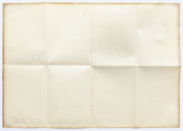 istock Blank sheet of paper folded in eight, isolated on white 2224457395