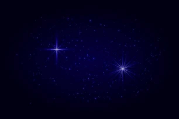 istock Soft blue sparkles and glowing star flares with particles. Light effects on transparent dark background for festive scenes. 2224457710