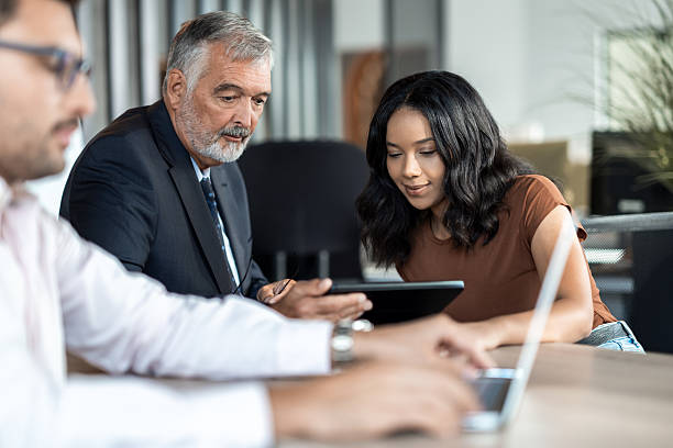 istock Diverse business team collaborating in meeting room 2224460013